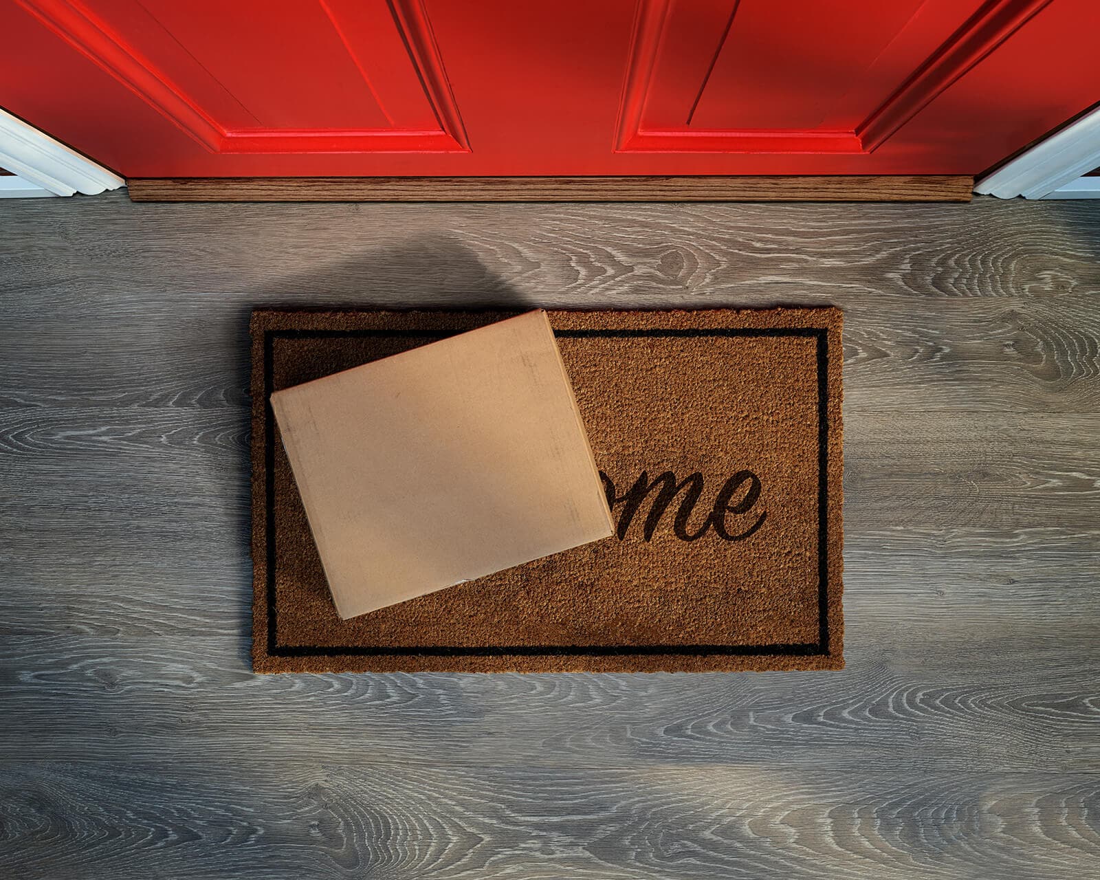 Discreet medication packaging being delivered to a doorstep.
